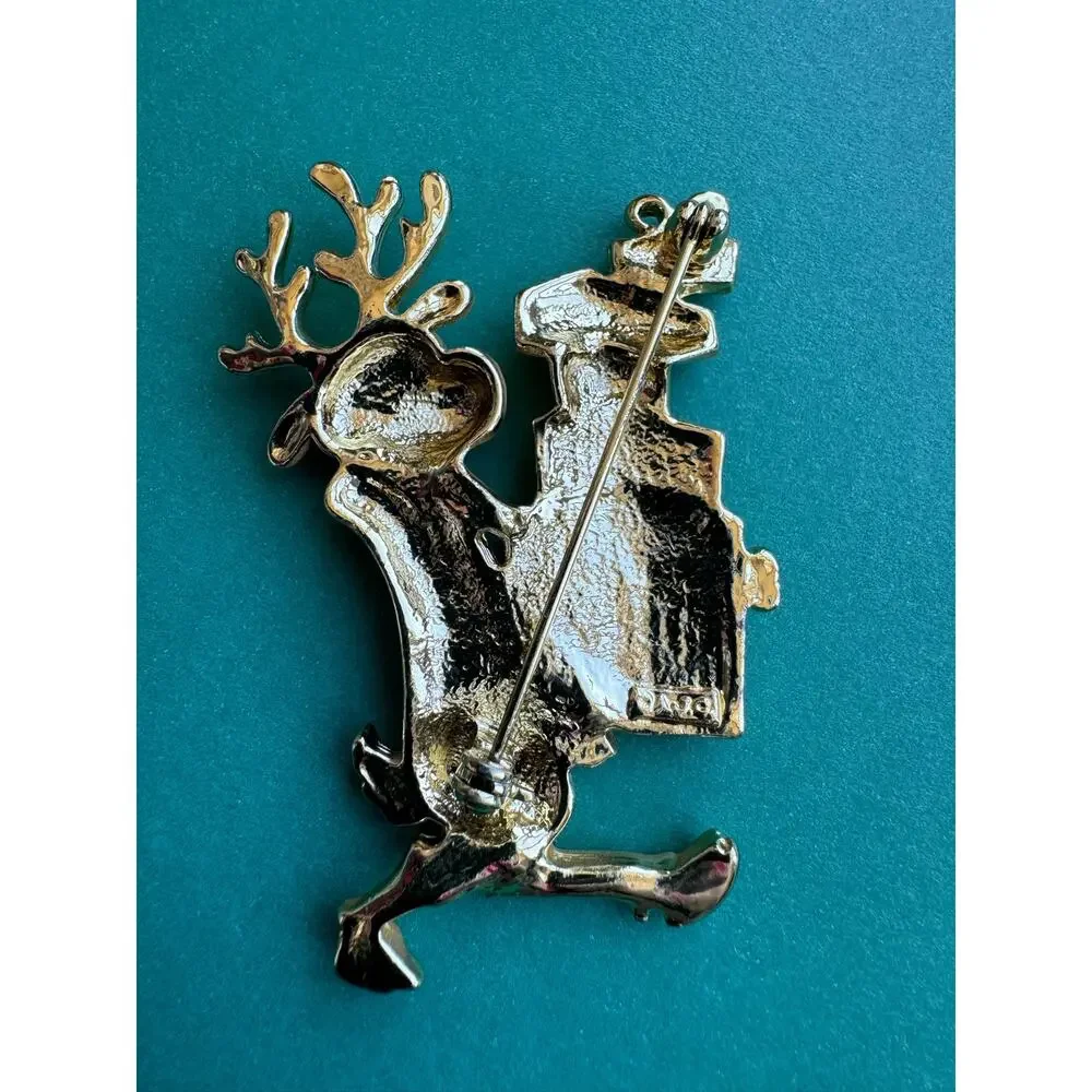 Vintage AJC Christmas Reindeer Carrying Gifts Matte Gold Tone Brooch Pin